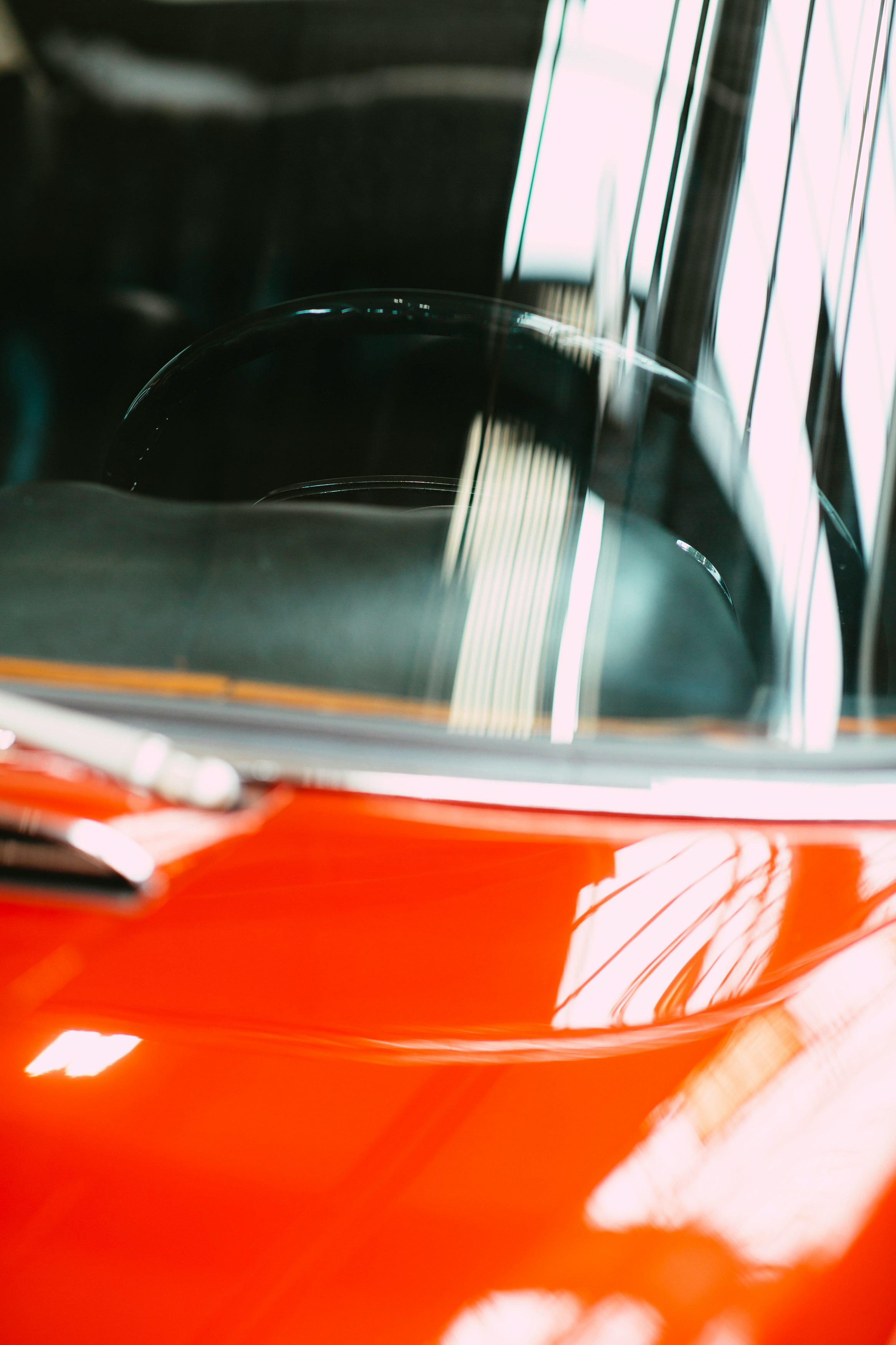 red car with white and black door